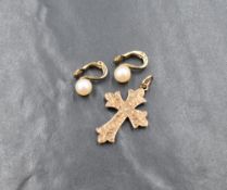 A pair of 9ct gold cultured pearl clip on earrings, the pearls having a white lustre with hinged