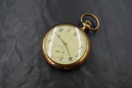 A gold plated top wound pocket watch by Tavannes, having an Arabic numeral dial with subsidiary