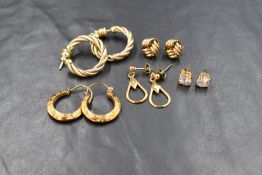 Five pairs of yellow metal earrings of various forms including 9ct & 14ct, approx 10.2g total