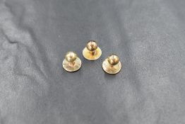 Three cased 9ct gold collar studs, of traditional plain form, marked 375, 2.2g
