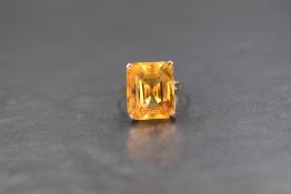 A 14ct gold citrine set ring, the emerald cut citrine measuring approximately 14.2mm x 11.5mm x 11.