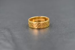 A 22ct gold engraved wedding band, size L & approx 4.5g