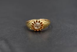 An 18ct gold diamond set gypsy style ring, the old cut diamond measuring approximately 0.33ct, in