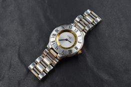 A ladies Must de Cartier 21 quartz wrist watch, model: 1330 having a black Roman numeral outer