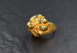 A gold plated costume ring by Kenneth Jay Lane (new York) of cushioned dome form, size L/M
