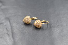 A pair of 14ct gold cubic zirconia set heart shaped cluster earrings on loop drops, approx 3g