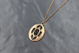 An 18' rose gold fine belcher link chain stamped 9ct having a rolled gold pendant, approx 4.8g