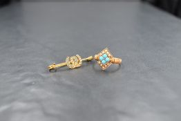 A yellow metal presumed gold turquoise and seed pearl set ring, the four central turquoise cabochons