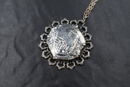 An Eight Reales 'Piece of Eight' coin, from the Lucayan Beach Pirate Treasure Trove of 1628,