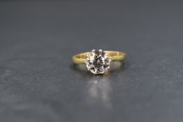 An 18ct gold diamond set solitaire ring, the round cut diamond measuring approximately 2ct in a