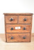 A miniature 2 over 2 mahogany chest of drawers, h23cm x w20.5cm