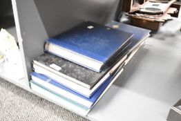 A group of 5 stamp albums, subjects include Commemorative, Countries and Wild Life ect