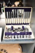 A vintage canteen containing a quantity of stainless steel cutlery, made in Sheffield, (41)