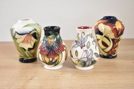 A Moorcroft pottery 'Parasol Dance' pattern vase of lobed form, impressed and painted marks to base,