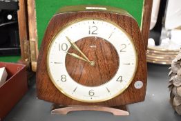 An early 20th century 'Smiths' 8 - day mantel clock, having floating balance wheel and single gong