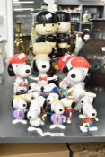 A quantity of snoopy figures, largest h20.5cm, sold together with Homepride flour shakers, a