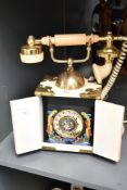 A vintage style rotary telephone having faux ivory decoration, h32cm