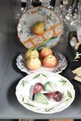 A set of 3 ceramic fruit display bowls, marked to base 'Made in Italy', largest w27cm