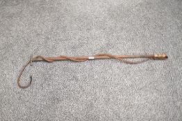 A plaited leather riding crop having metal hammer top, L93cm