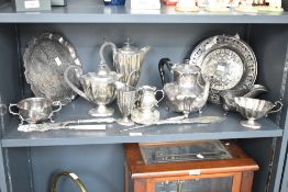 A silver plated 3 piece tea service comprising tea pot, coffee pot, scalloped edged plate, gravy jug