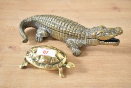 A brass crocodile form lidded box, impressed marks to base, L23.5cm, sold together with a brass