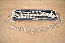 A long string of baroque pearls, approximately 56