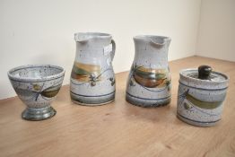 A pair of Askrigg pottery pitchers, impressed mark to base for Andrew Hague (1948-), sold together