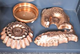 Two copper fish jelly or mousse moulds, sold together with another jelly mould and a copper bowl, (