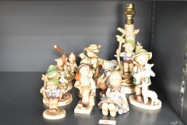 A ceramic Goebel Hummel 'Apple Tree Boy' lamp, mark to base, h24cm, sold together with a shepherd