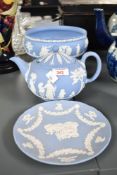 A Wedgwood Jasperware tea pot decorated with neo-classical motifs, h13cm, sold together with a