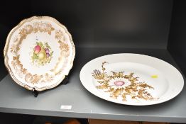 A vintage Kaiser West German Silberdistel pattern plate decorated with floral designs on a white