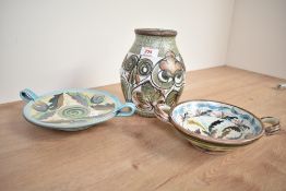 A Denby 'Glyn Colledge' stoneware vase of barrel form, decorated with floral patterns and having