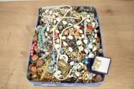 A large collection of costume jewellery including beaded necklaces, faux pearls, paste set pieces
