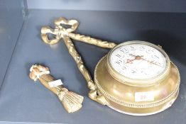 A 19th/early 20th century Paul Garnier, Paris circular brass clock, having a white enamel dial