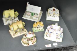 A group of Coalport model houses, to include The Country Cottage, The Master's House and Keepers