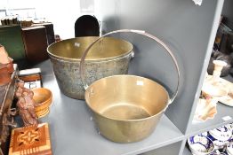 A large 19th century brass jam pan having iron handle, w36cm, sold together with another jam pan, (