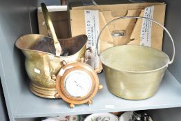 A barometer in the form of a ships wheel, w20cm, sold together with a jam pan and coal scuttle