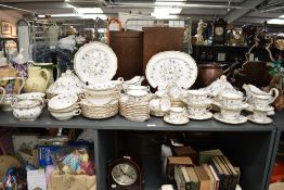 A Spode 'Campanula' pattern fine bone china dinner service having gilt edging and floral designs, to