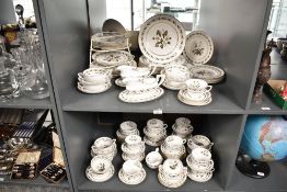 A Royal Worcester Bernina pattern fine bone china dinner service, decorated with gold colour