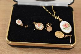 A 9ct gold paper link chain having enamelled rose pendant with two pairs of matched earrings, marked