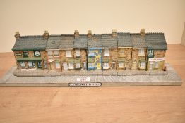 A coronation street town house figure depicting Rovers Return Pub, makers mark to back for John Hine