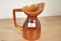 Dr Christopher Dresser (1834 - 1904), A late 19th / early 20th century Linthorpe pottery jug, having