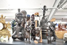 A group of African tribal figures, hand carved in ebony, to include a female bust ect, ( 8 ).