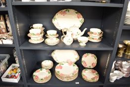 A Franciscan 'Desert Rose' pattern dinner service, decorated with floral designs on a cream