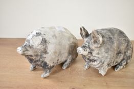 A pair of Wemyss Ware pigs, impressed marks to base, H10.5cm
