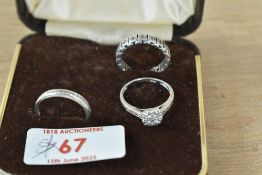 A silver and cubic zirconia cluster ring and band wedding set, the illusion set cluster ring with