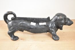 A cast iron Dachshund boot scraper, L37cm