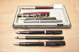 A selection of fountain pens, ballpoint pens and propelling pencil including a Conway 106, a