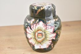 A Moorcroft pottery 'Gustavia Augusta' pattern ginger jar with cover, designed by Debbie Hancock