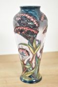 A Moorcroft pottery 'Gypsy' pattern vase of slender form, designed by Rachel Bishop, having